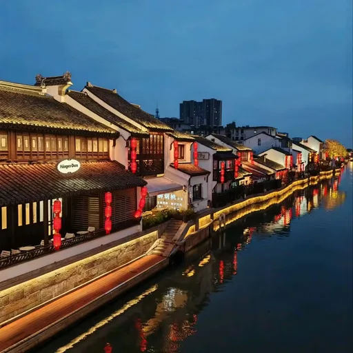 A classical Suzhou garden with pavilions over a pond