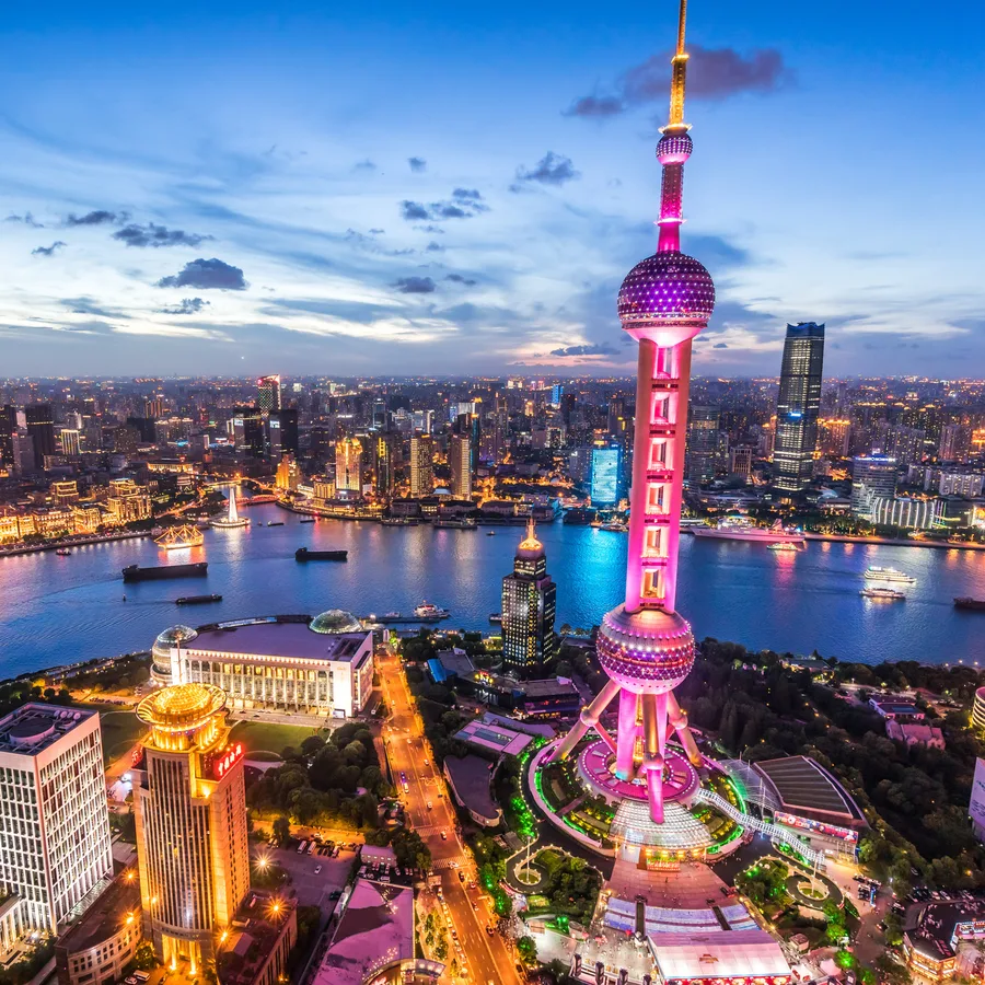 Shanghai's Lujiazui skyline and the Oriental Pearl Tower at dusk