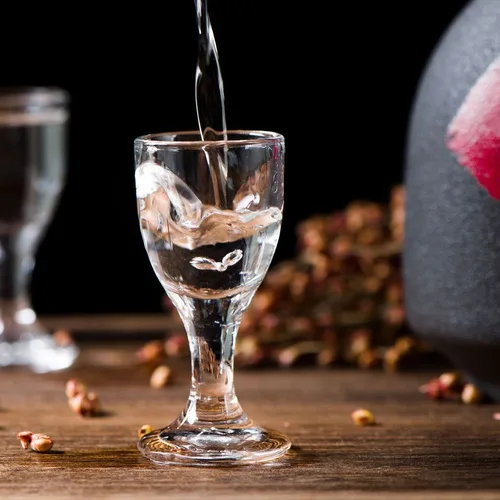 Baijiu being poured into a small glass
